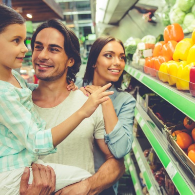 Family buying groceries | Shutterstock, George Rudy