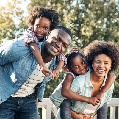 Happy family on deck | Getty Images
