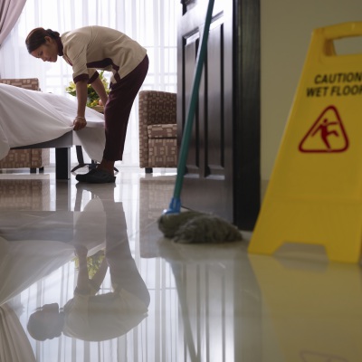hotel cleaning staff | Shutterstock, Diego Cervo