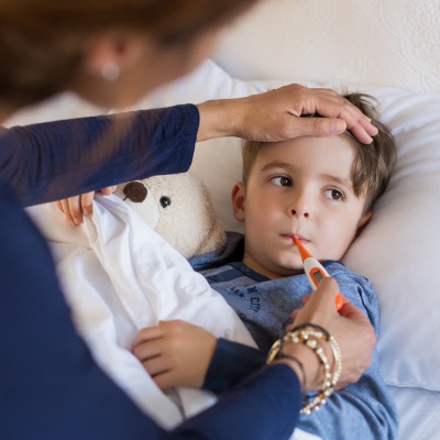 Mom and sick child shutterstock_Rido