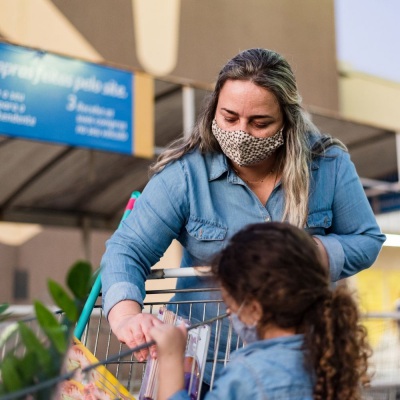 Mother and daughter grocery shopping