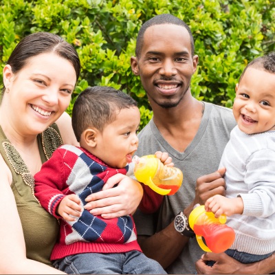 Multiracial family with toddlers | Getty Images