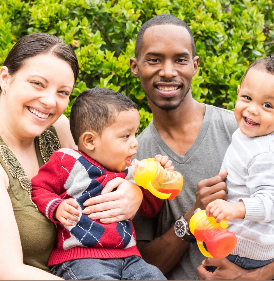 Multiracial family with toddlers | Getty Images