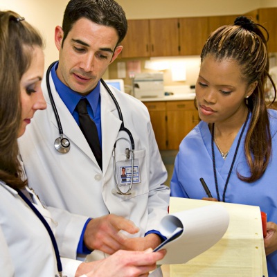 Nurse and doctor talking