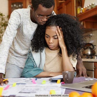 Concerned young couple | Shutterstock, WAYHOME studio