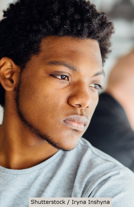 Concerned African American young man | Shutterstock, Iryna Inshyna