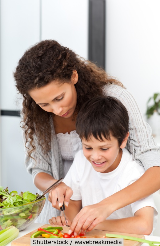 Woman and her son preparing dinner | Shutterstock, wavebreak media